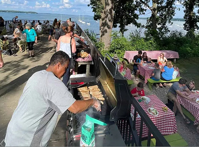 A man grilling at a cookout